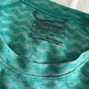 Men’s Patagonia and North Face hiking tops